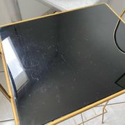 Vintage 1960s brass and smoked glass side table with magazine holder.