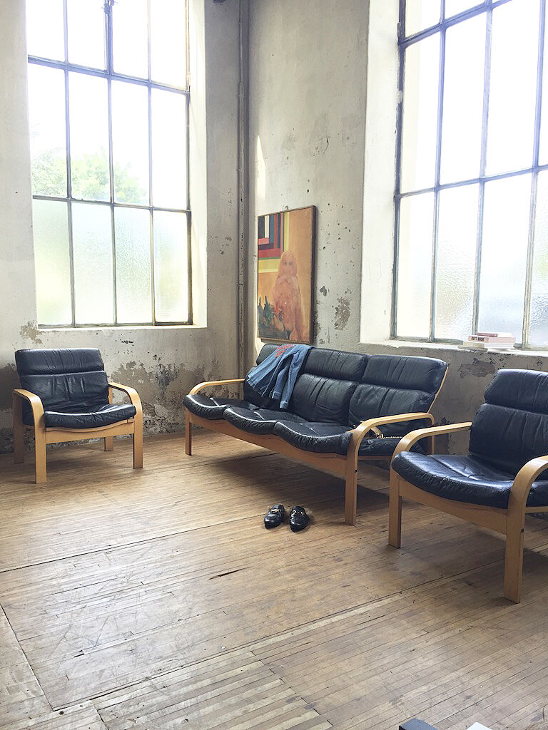 Danish sofa and armchairs curved wood and leather