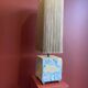 Base stuck blue beige marble-plaster, fringed lampshade Houles, 21st century.