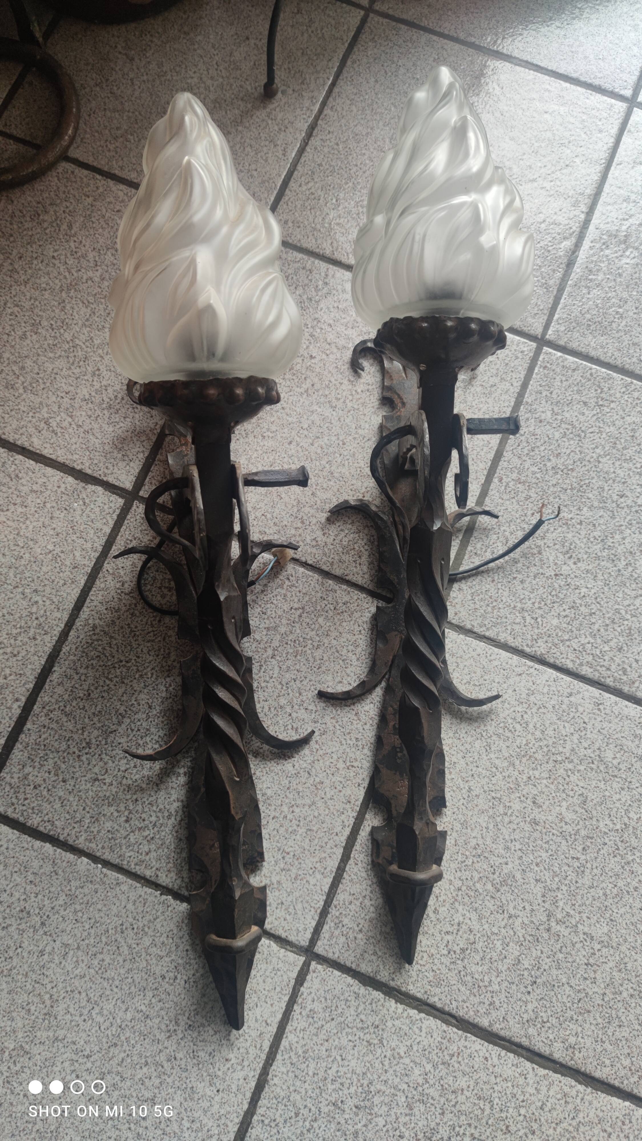 Pair of steel and glass torchieres circa 1950