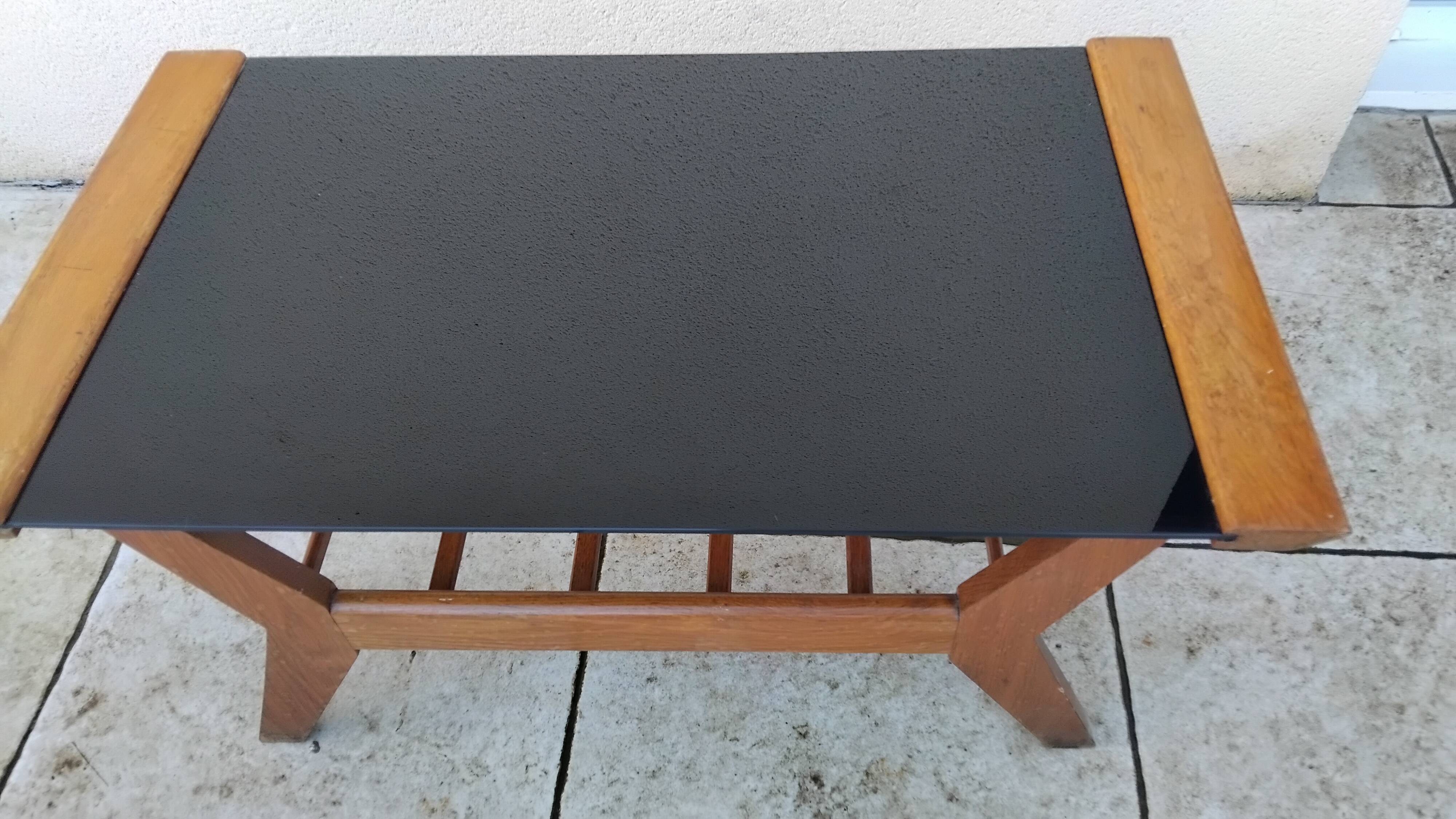 Vintage coffee table from the 1950s reconstruction, wood and glass.