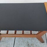 Vintage coffee table from the 1950s reconstruction, wood and glass.