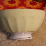 Antique earthenware bowl, pastel yellow