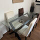 Habitat glass and wood dining table with 4 matching chairs.