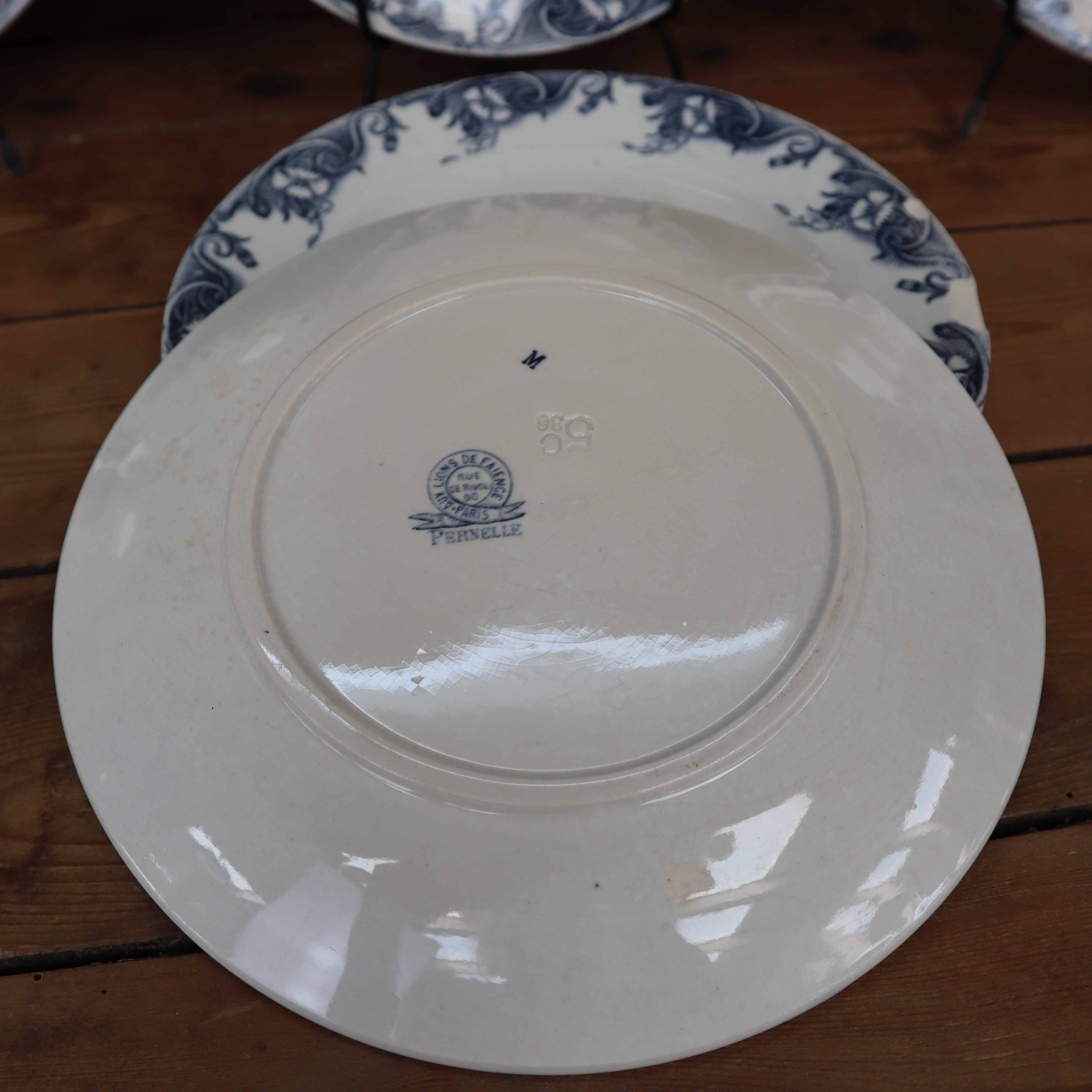 Antique earthenware dessert plates with the lions of France "Pernelle"