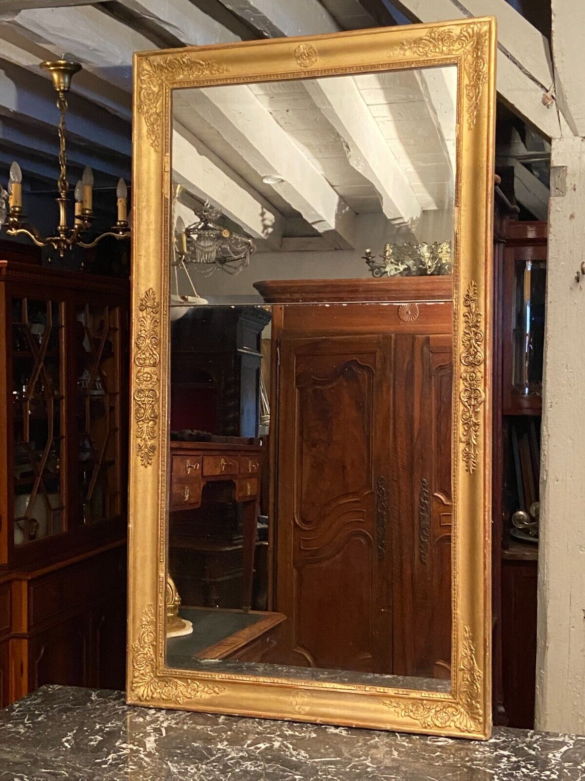 Large mirror fireplace mirror in wood and gilded stucco XIX Restoration
