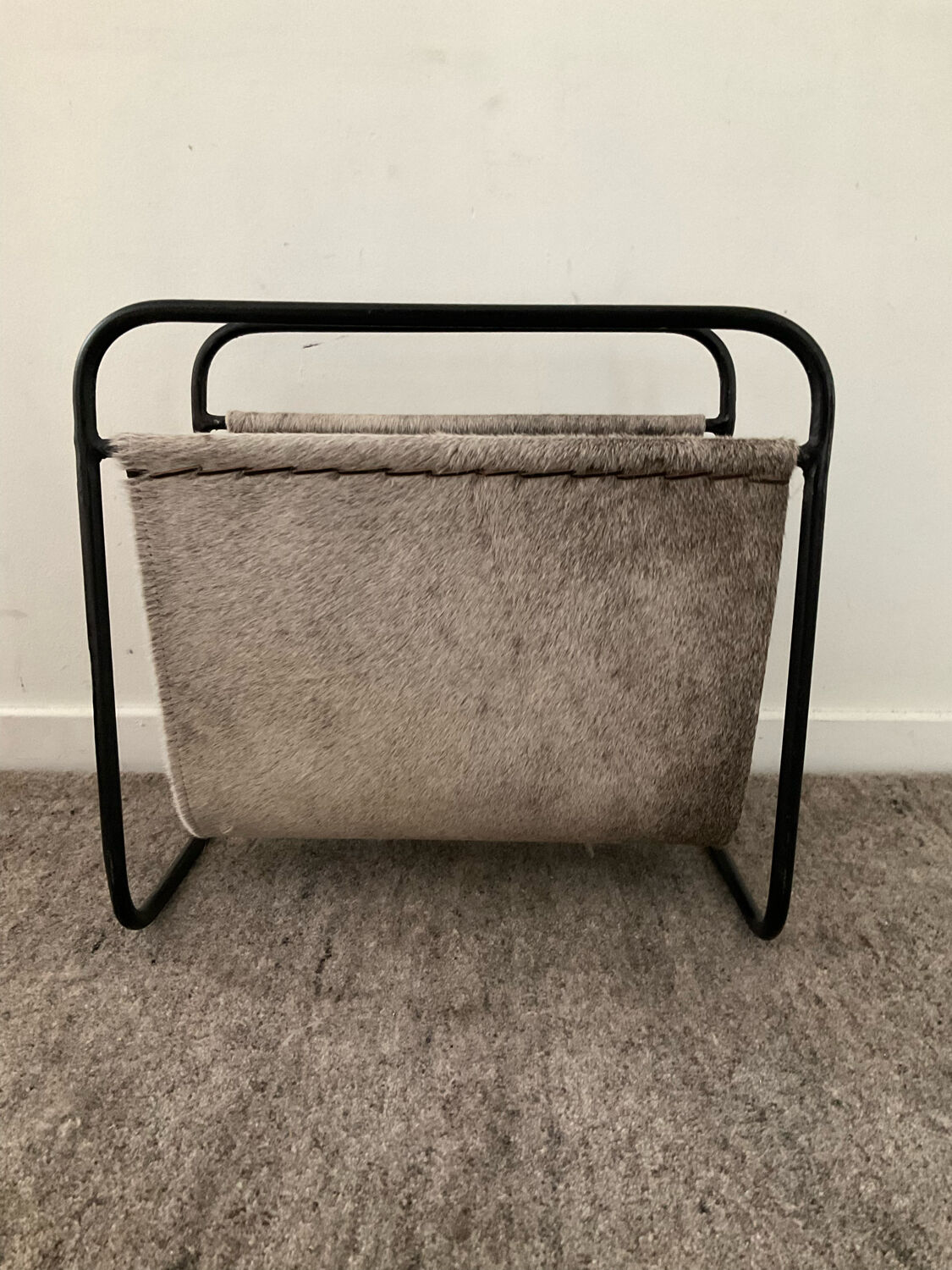 Vintage magazine holder in metal and leather