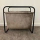 Vintage magazine holder in metal and leather