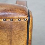 Art Deco sheep leather armchair with a lot of character