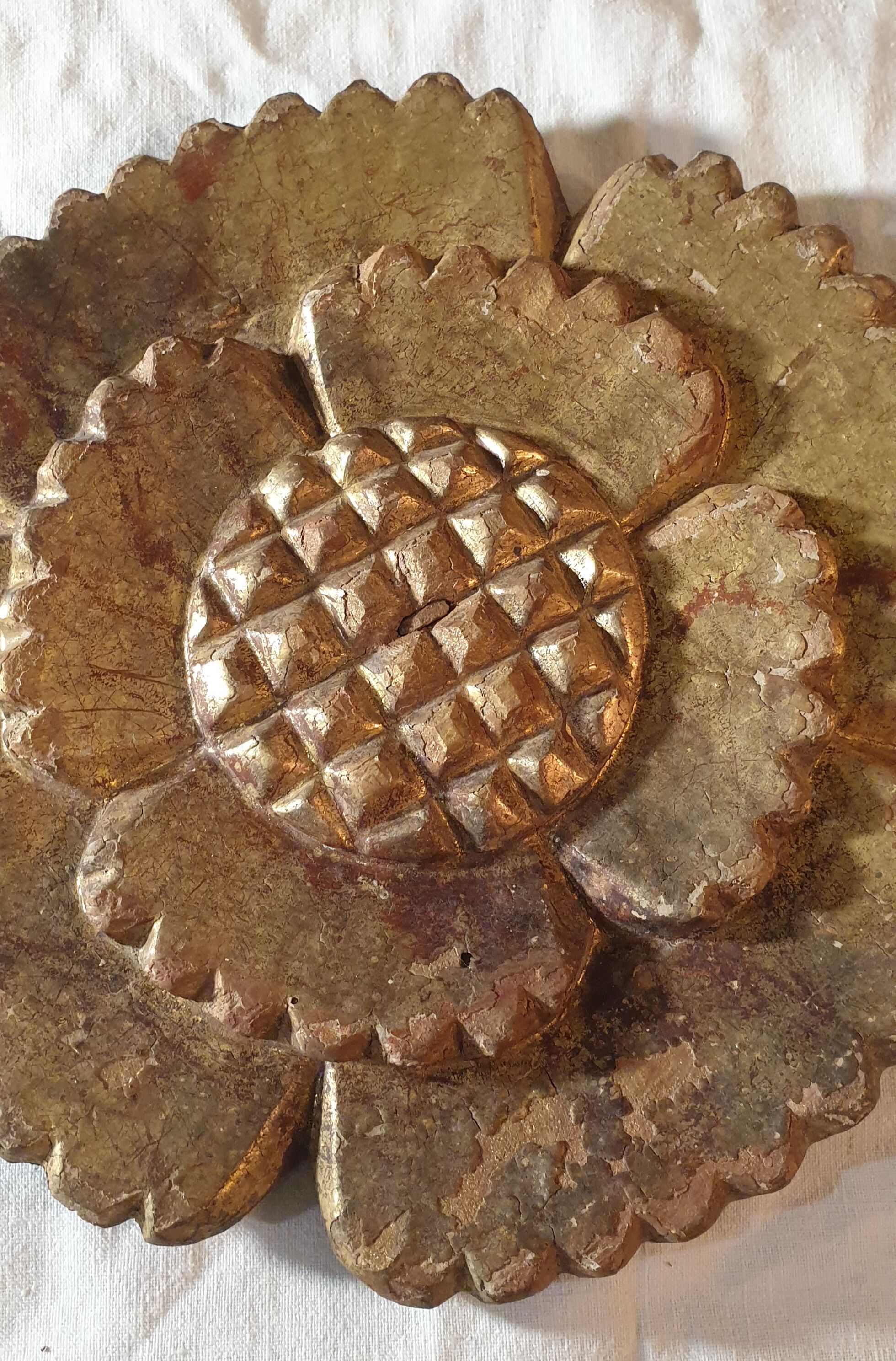 Flower in gilded wood