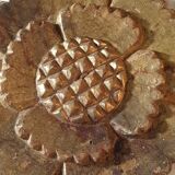 Flower in gilded wood