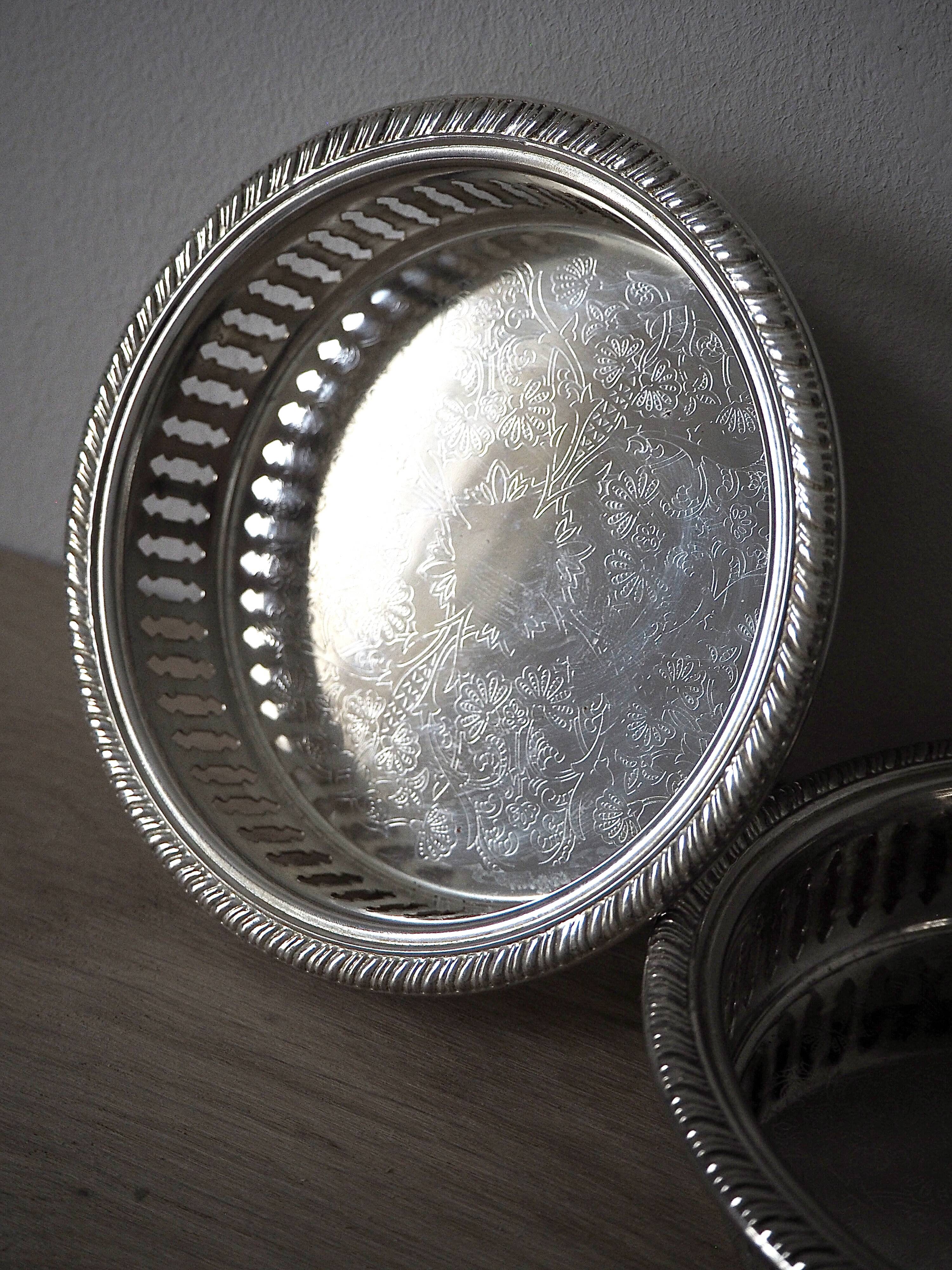 Pair of silver bottle underbellies