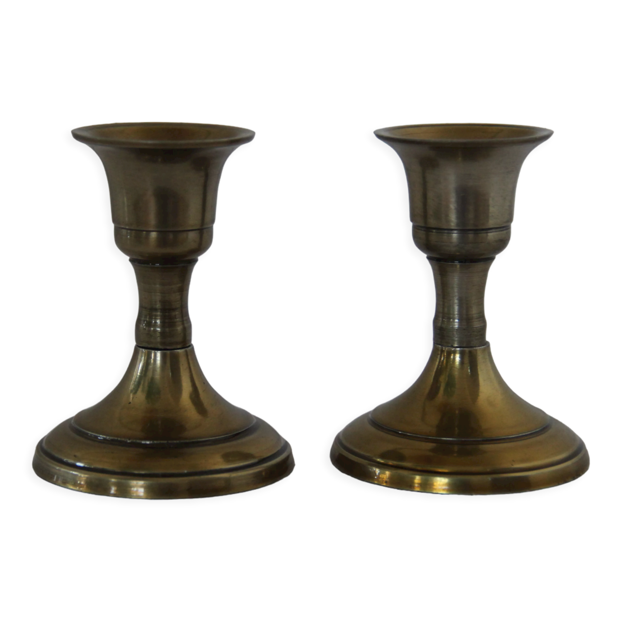 Small golden metal candle holders