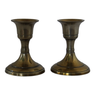 Small golden metal candle holders