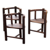 Set of three brutalist tripod armchairs in carved solid oak