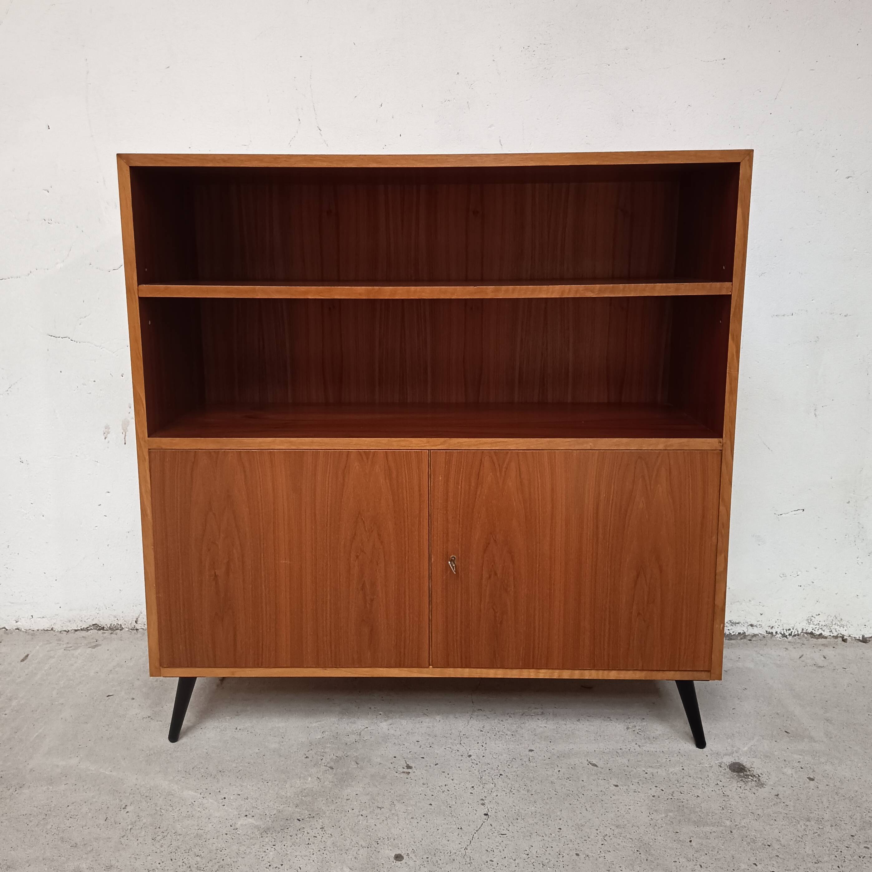 Semi-open, two-door cabinet, 1960