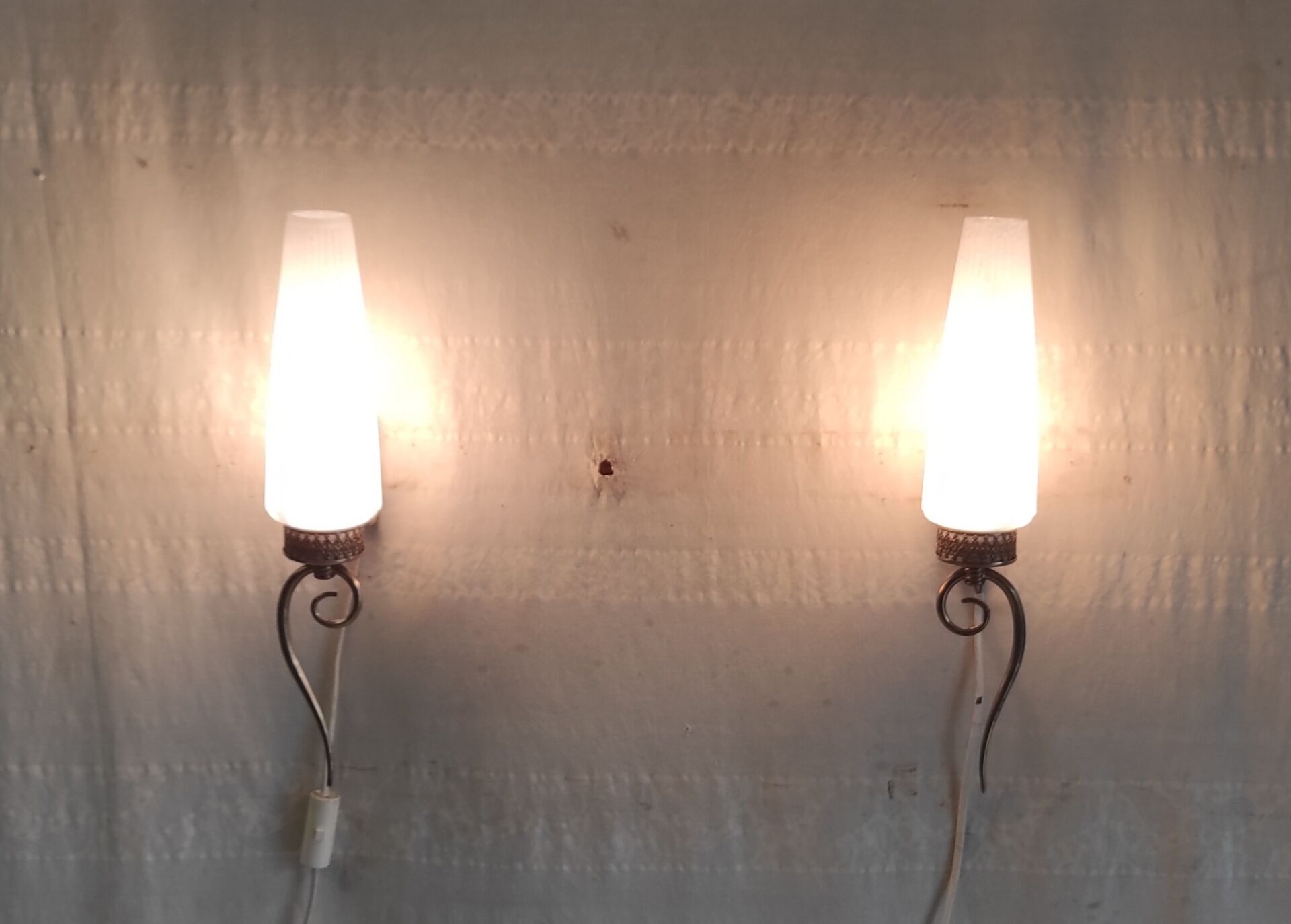 Modernist wall lights in brass and opaline - mid 20th century.