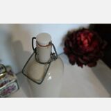 Sandstone bottle and porcelain cap