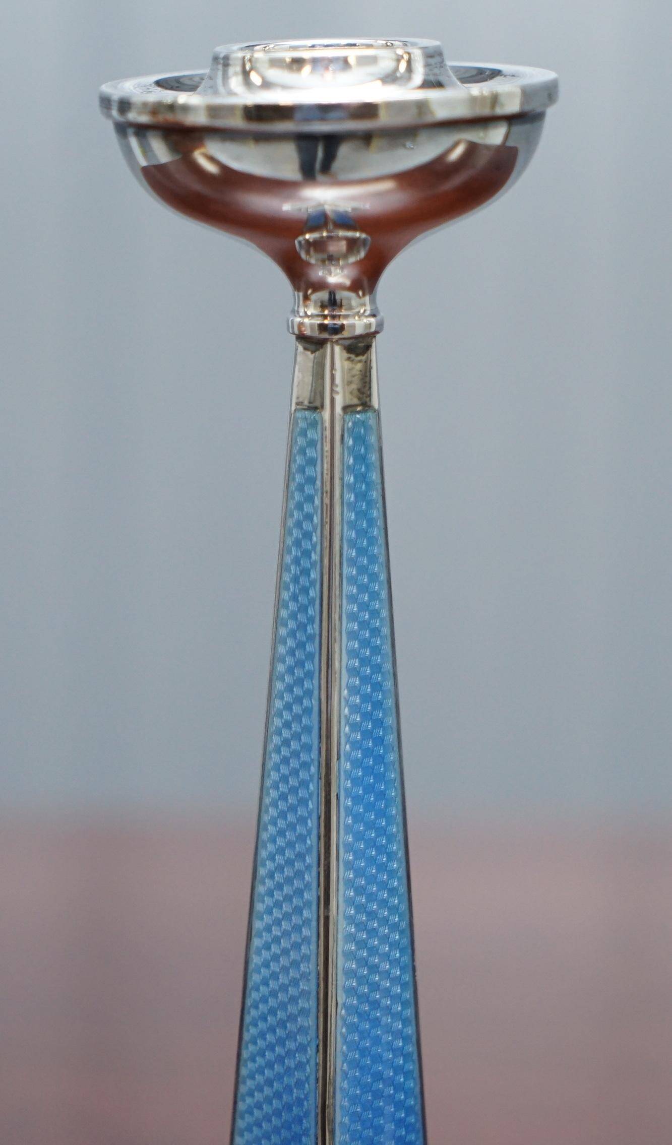Pair of sterling silver and enamel candlesticks 1927 by Charles Green & Co.