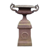 Cast iron garden urn on pedestal with handles