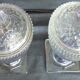 2 antique glass bonbonnières in the shape of pine cones.