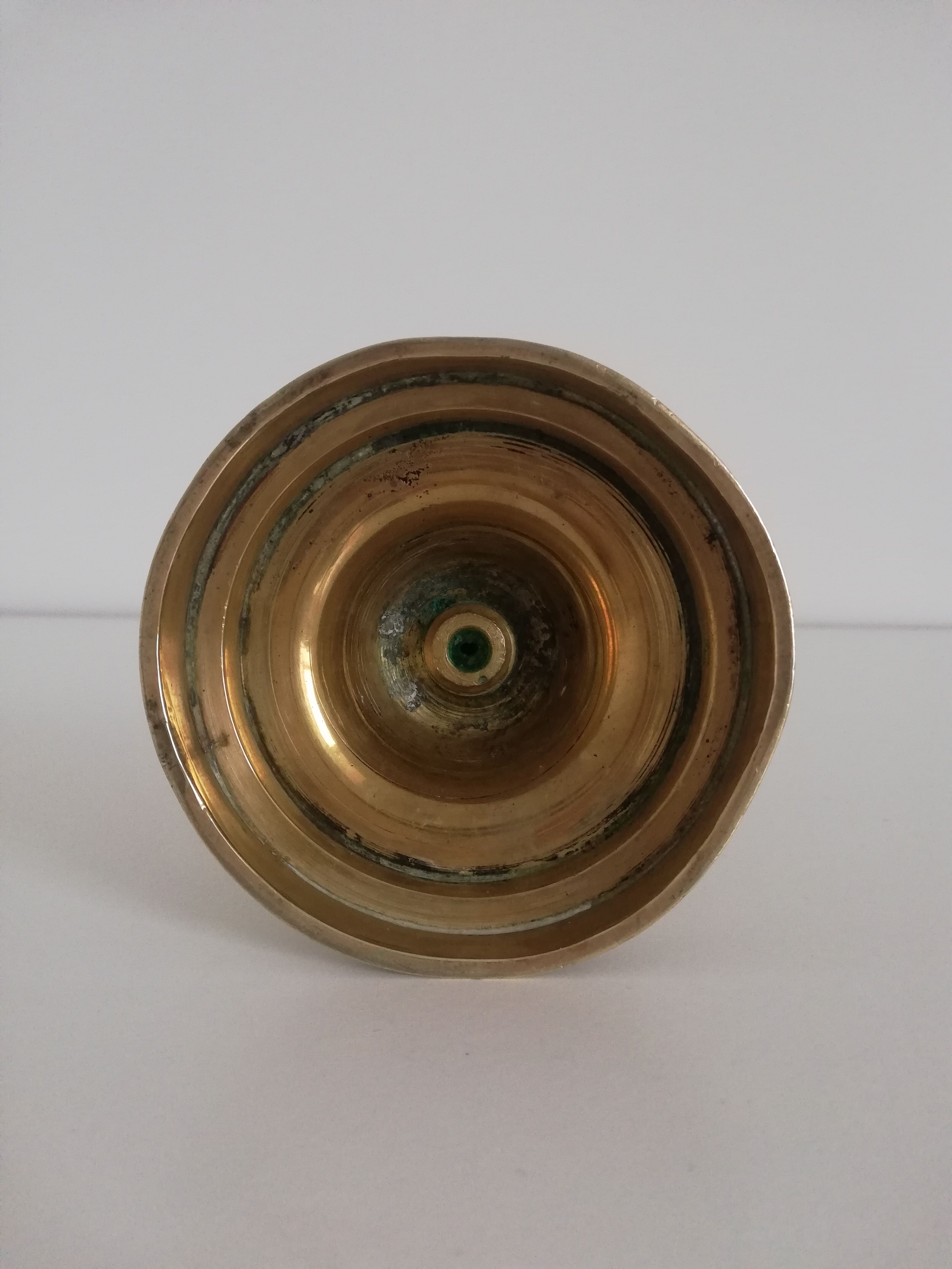 Vintage push candle holder