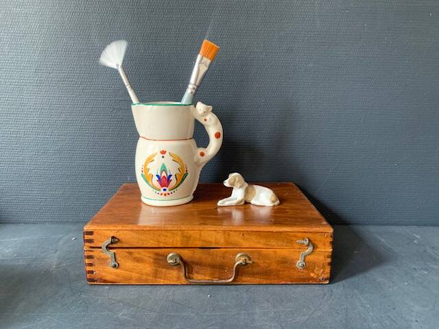Hand-painted earthenware cream pot with cat handle, 19th century