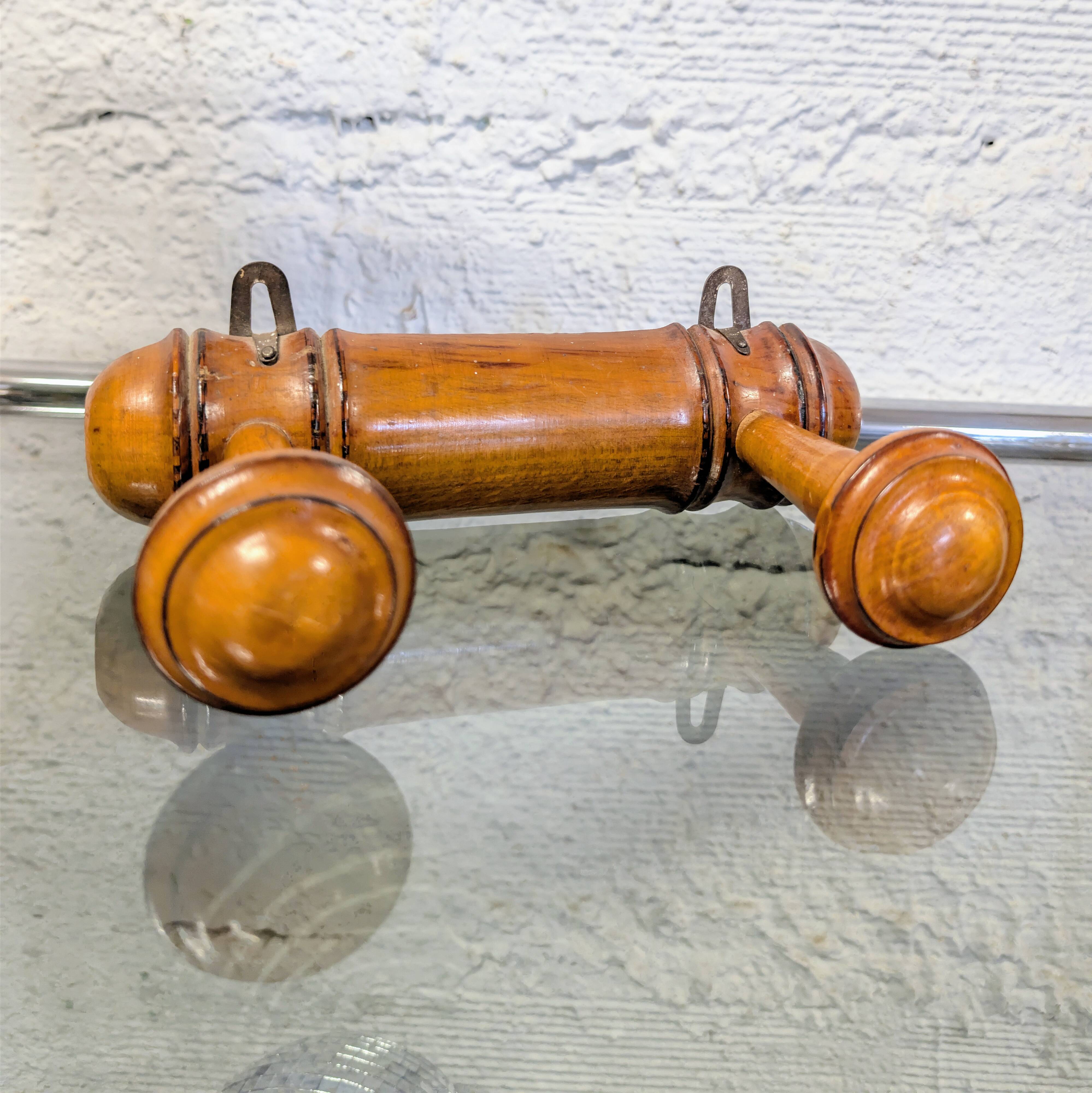 Turned wooden coat rack