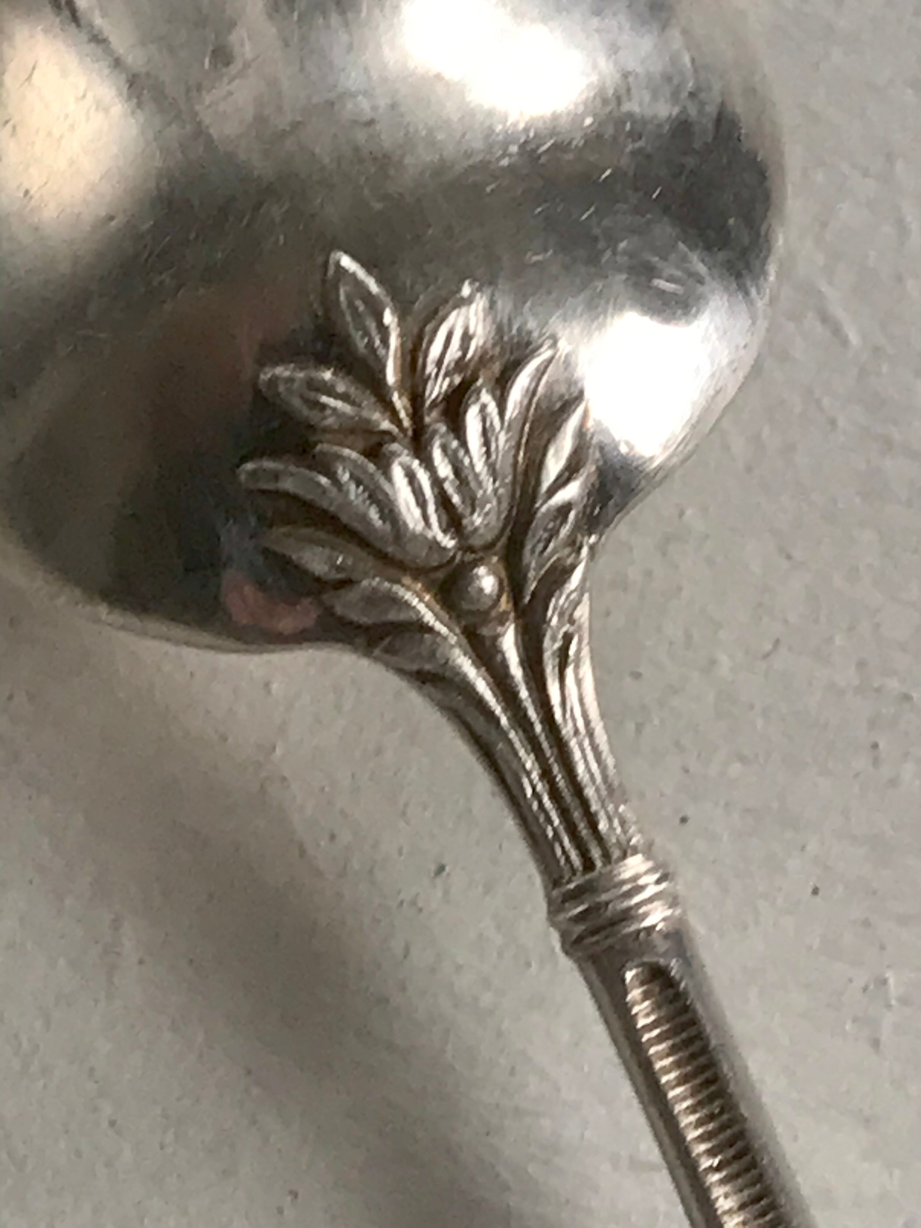 12 teaspoons silver metal