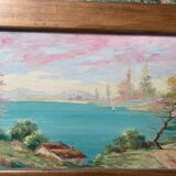 Pair of Art Deco wood and embossed metal landscape frames