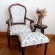Voltaire armchair and its ottoman