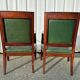 Paire de fauteuils de style Empire en acajou et cuir vert