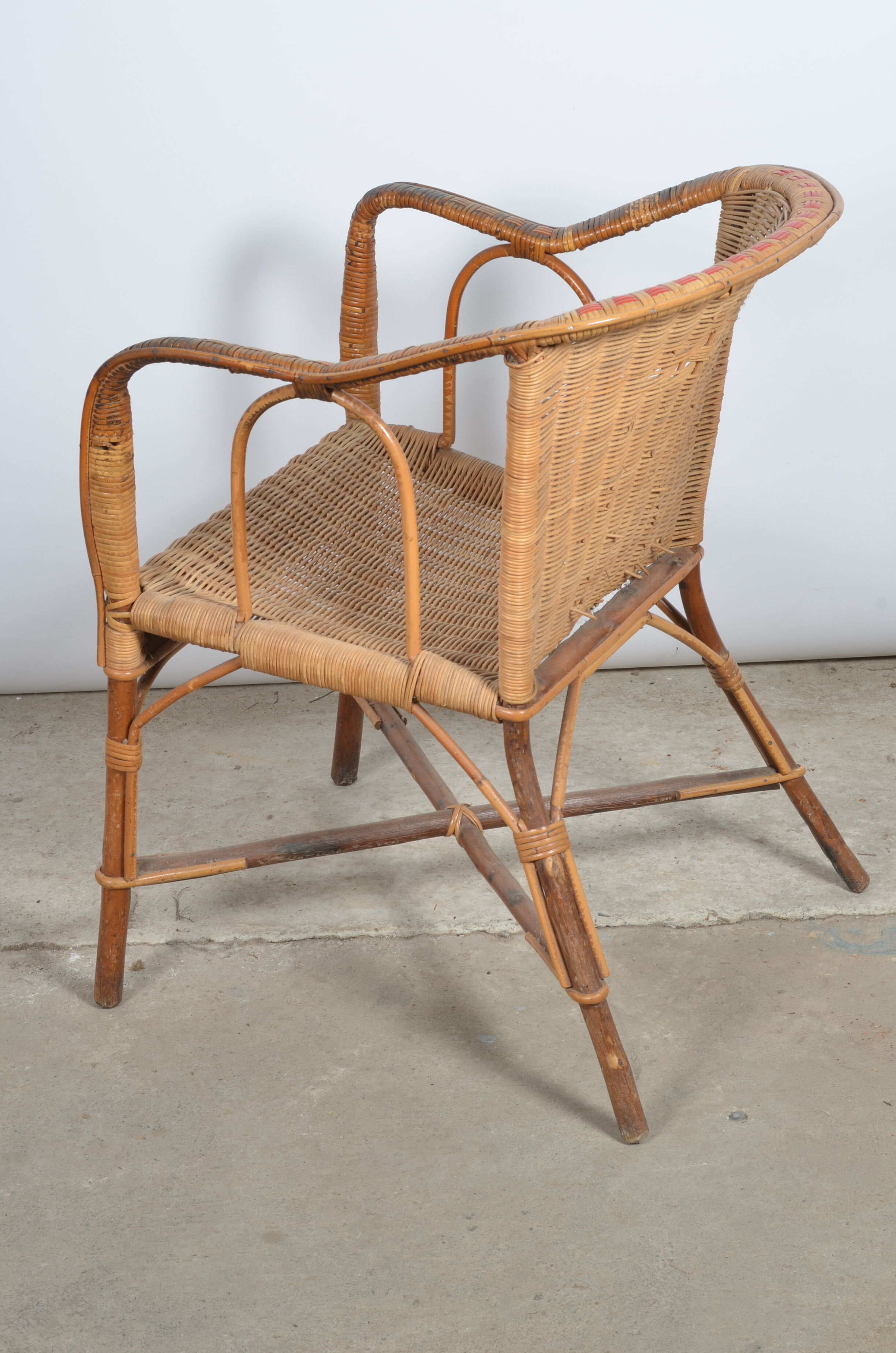 Rattan armchair and scoubidou décor