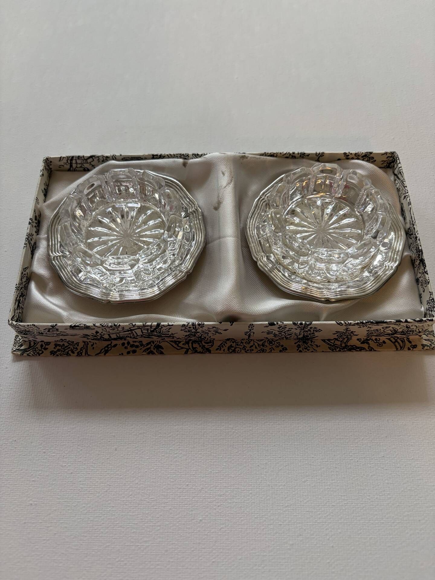 Crystal and silver-plated salt and pepper shakers