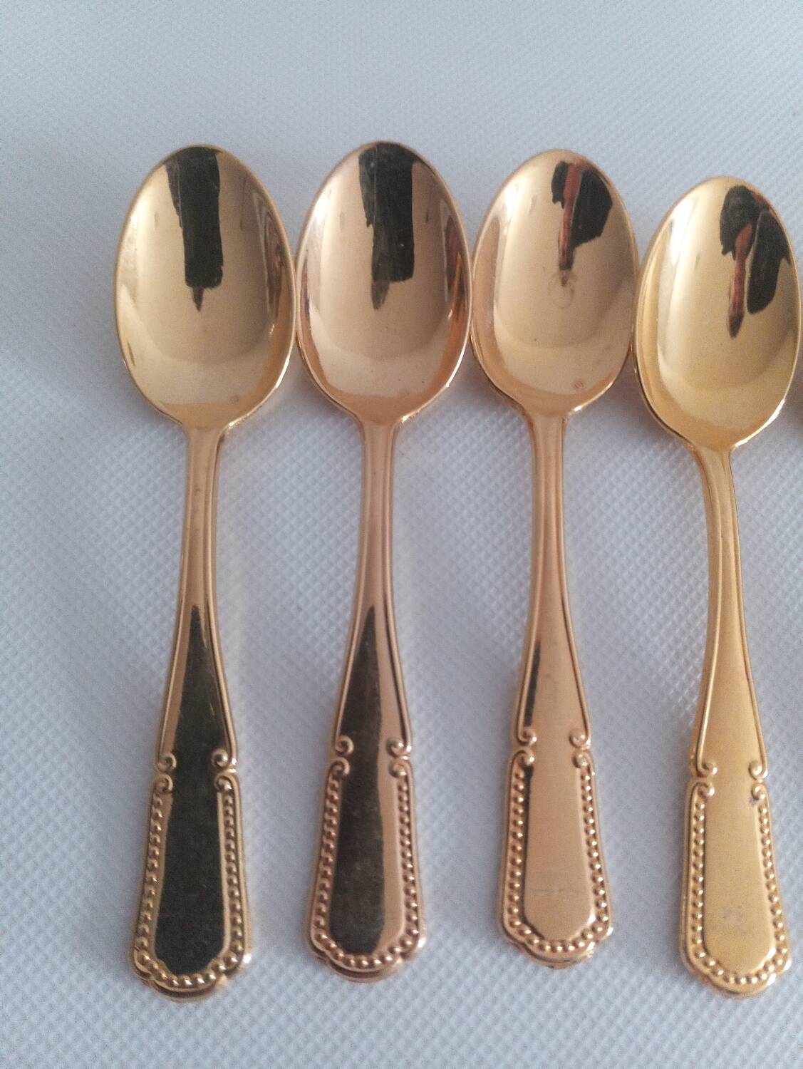 Gold coffee spoons and hallmark