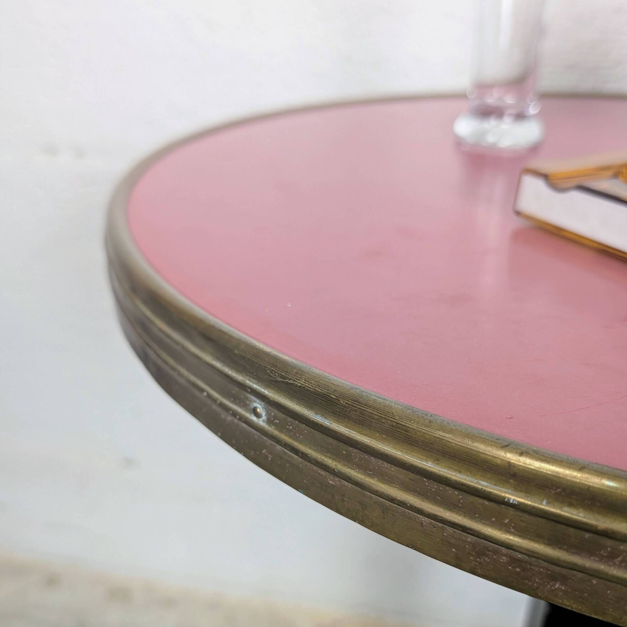 Pink and brass bistro table, Art Deco pyramidal base.