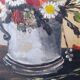 Vintage still life of a country bouquet signed J Dubois with a golden frame.