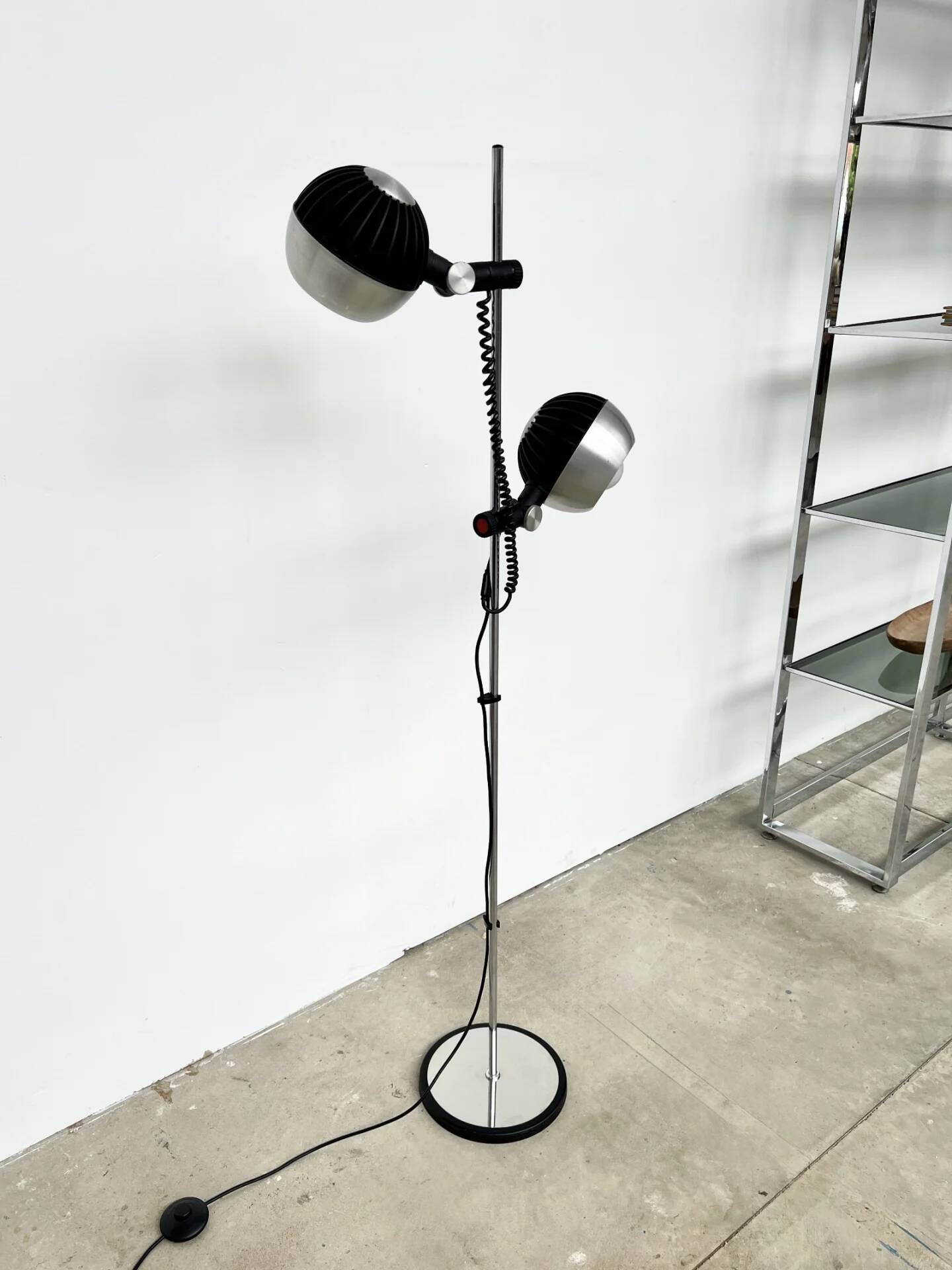 Two-spot floor lamp phase — brushed steel and matte black — 1970s