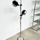 Two-spot floor lamp phase — brushed steel and matte black — 1970s
