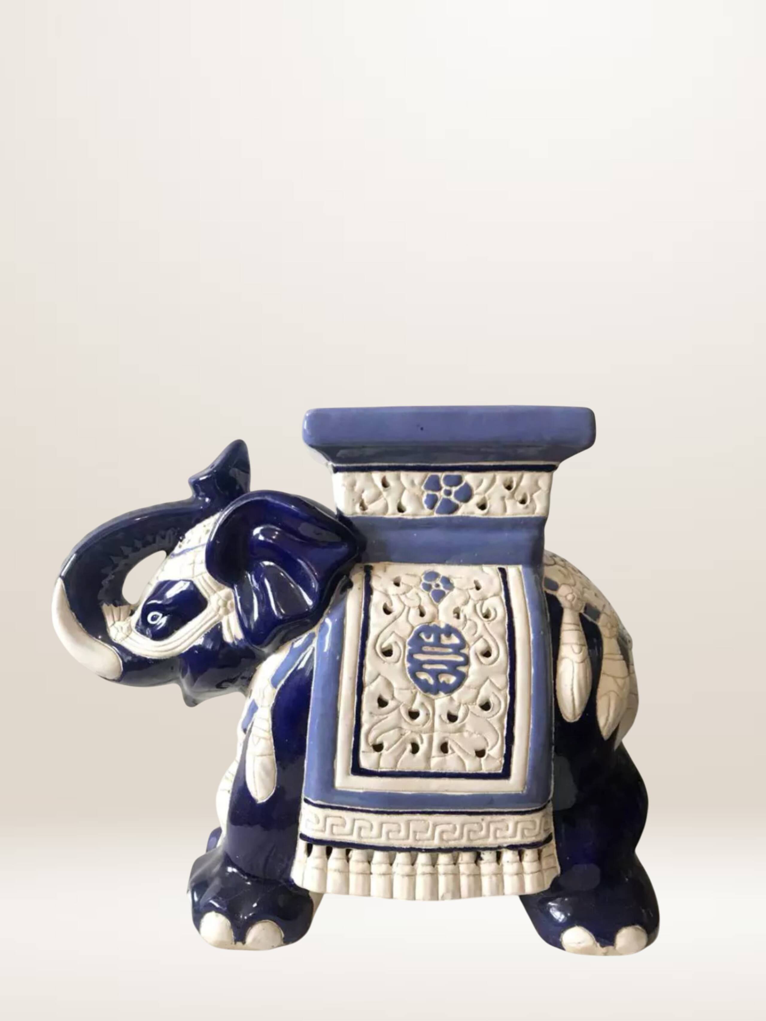 Pair of elephant ceramic side tables