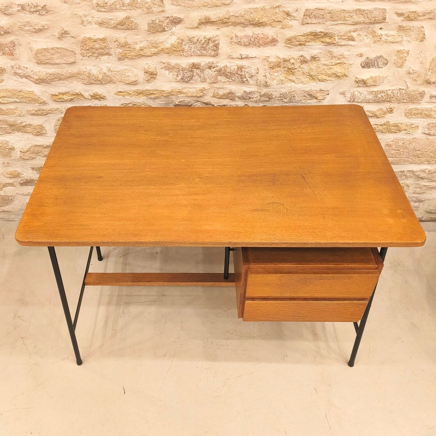 Modernist desk with suspended drawer unit, French work from the 1950s.