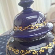 Cobalt blue porcelain bonbonnière with gold decoration on feet.