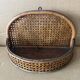 Antique cane wall shelf