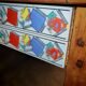 Small farmhouse table in light wood and tiled floors