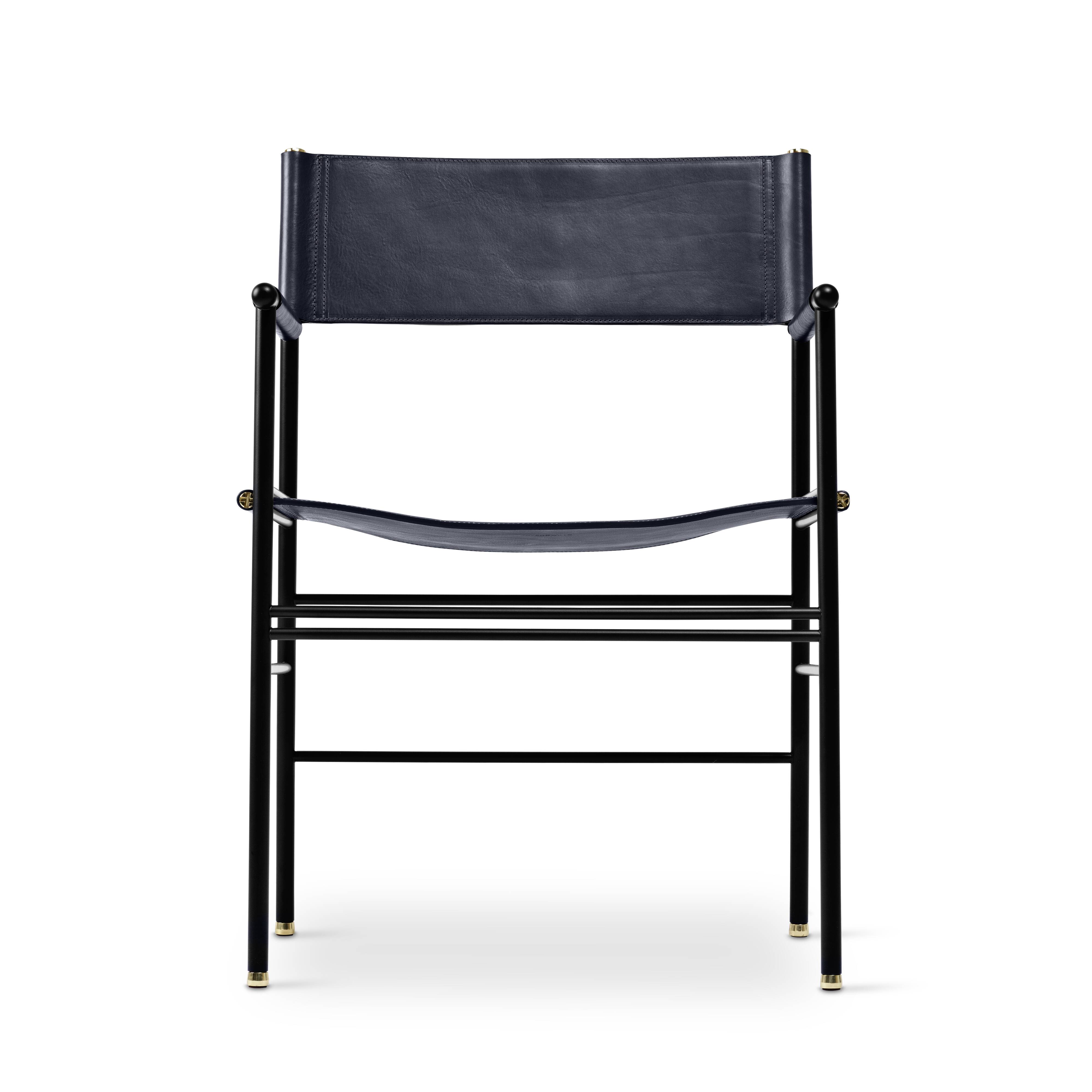 Timeless bar stool with a navy blue leather backrest and black metallic rubber.