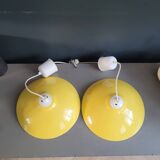 Pair of yellow lacquered metal pendant lights