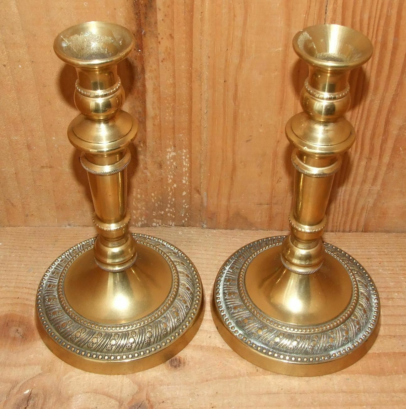 Pair of empire-style candlesticks or gilded bronze restoration