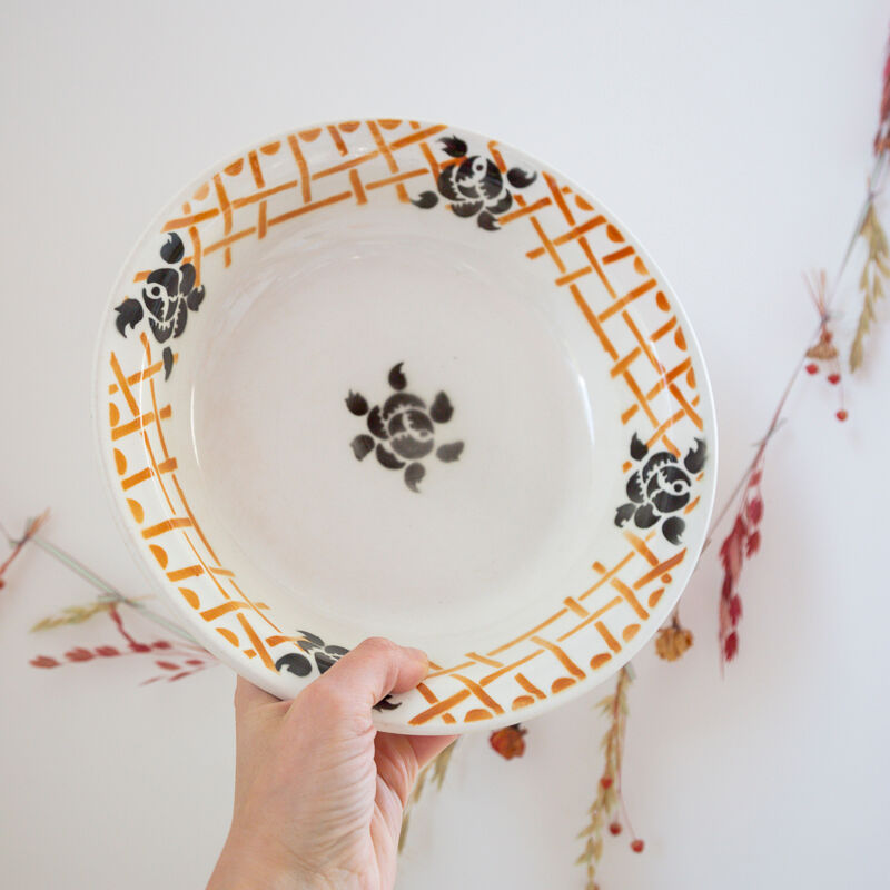 Salad bowl flat black flowers and geometric patterns Badonviller Roscoff