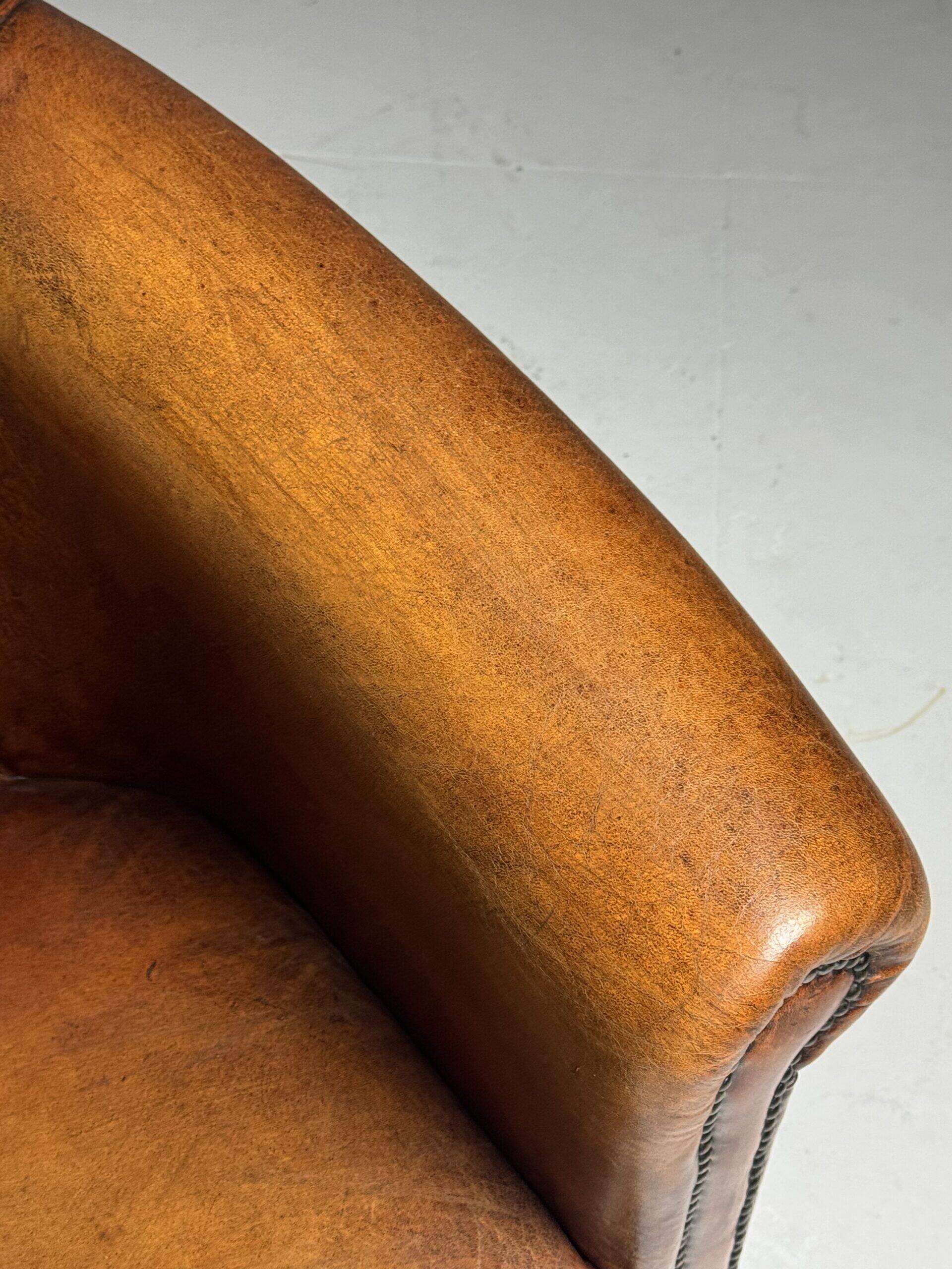 Fauteuil club en peau de mouton 2x classique