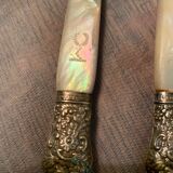 Set of coat of arms fruit cutlery